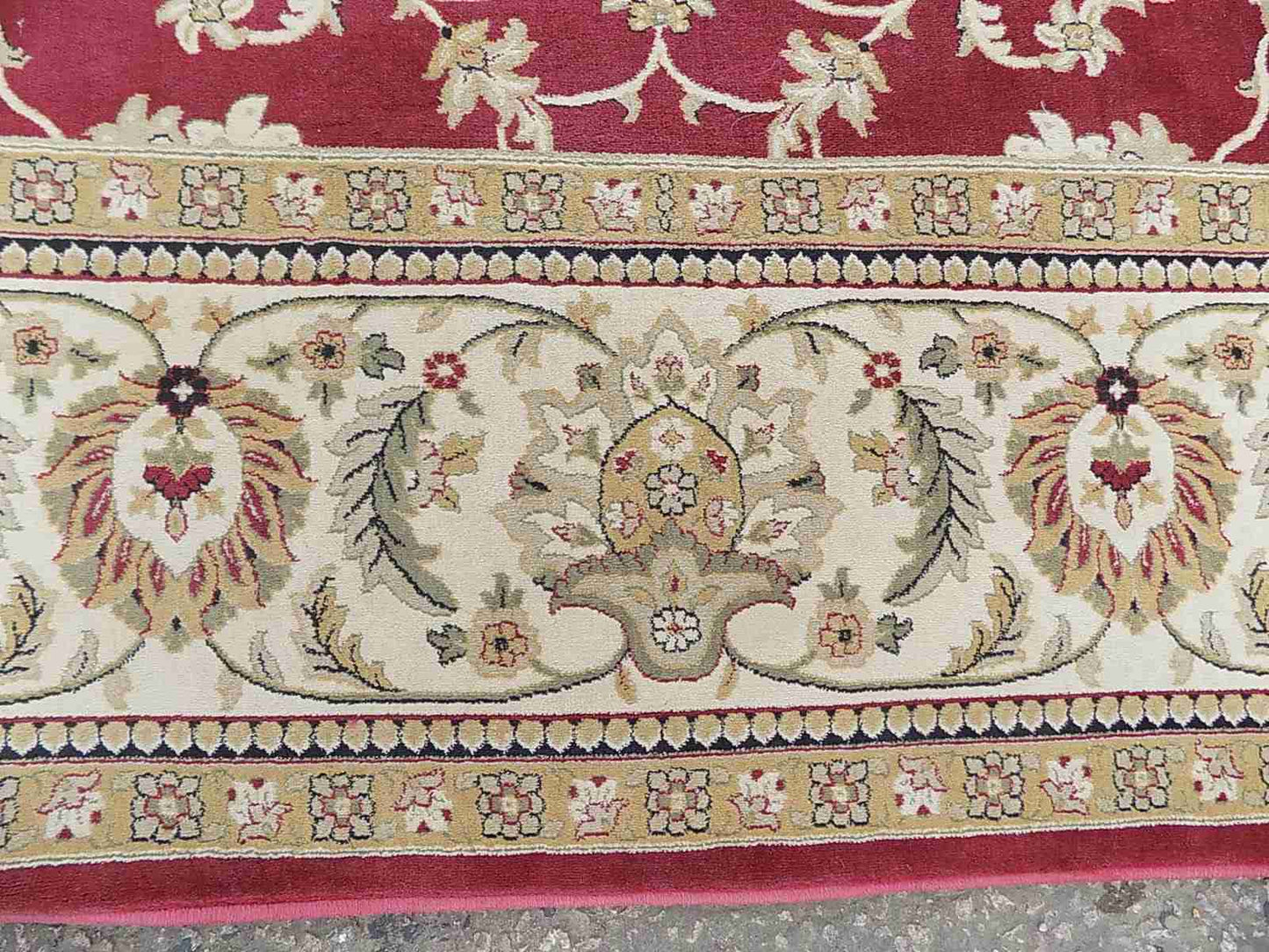 Red cream carpet with floral design