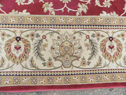 Red cream carpet with floral design