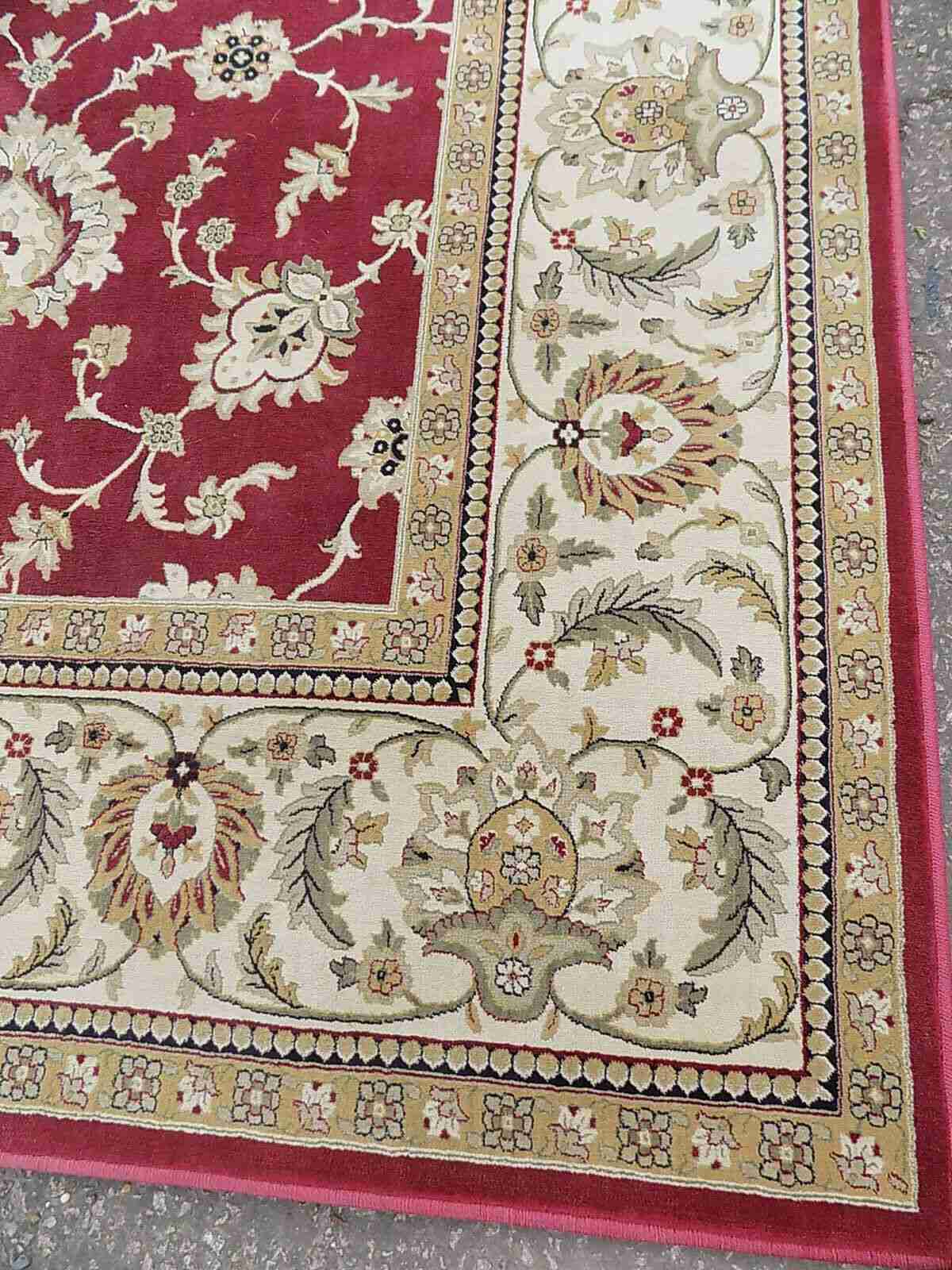 Red cream carpet with floral design