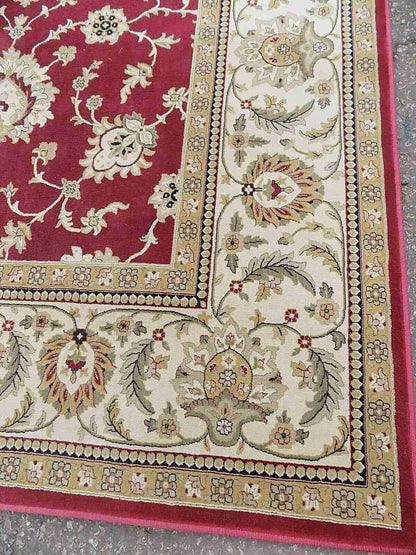 Red cream carpet with floral design