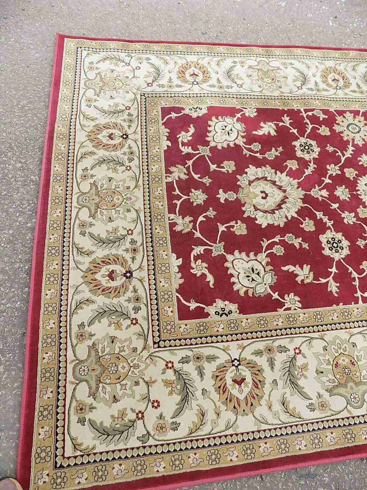 Red cream carpet with floral design