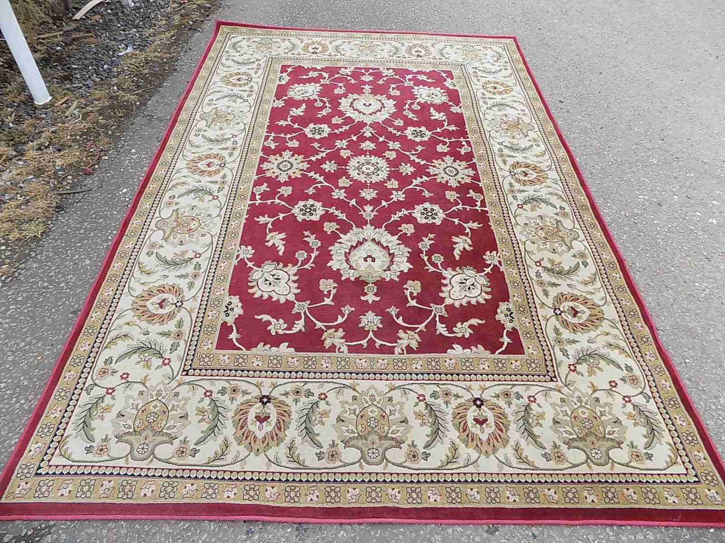 Red cream carpet with floral design