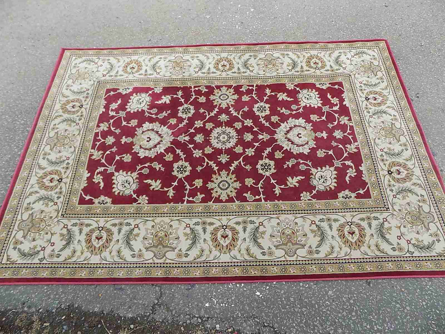 Red cream carpet with floral design