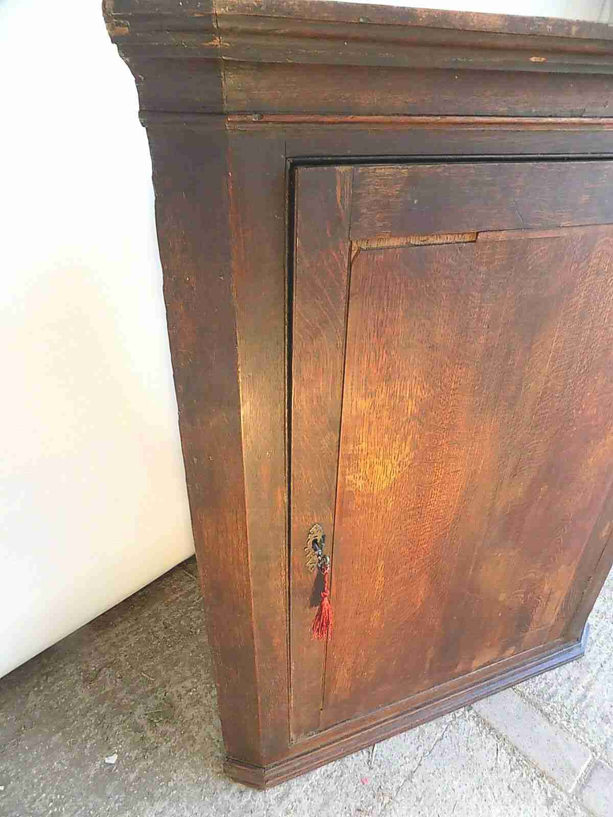 Victorian large oak corner cabinet with crimped shelves